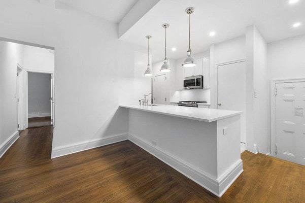 Open Concept Kitchen Island Luxury Renovated Upper East Side Rental Apartment UES Dishwasher Quartz