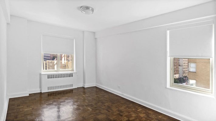 A bedroom in a high end NYC apartment rental