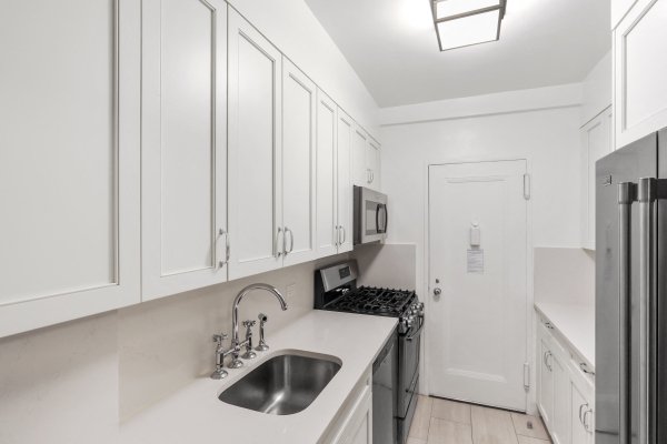 Separate kitchen luxury rental Upper East Side renovated apartment dishwasher UES