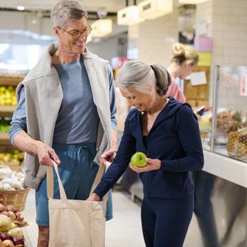 Couple shopping in grocery store